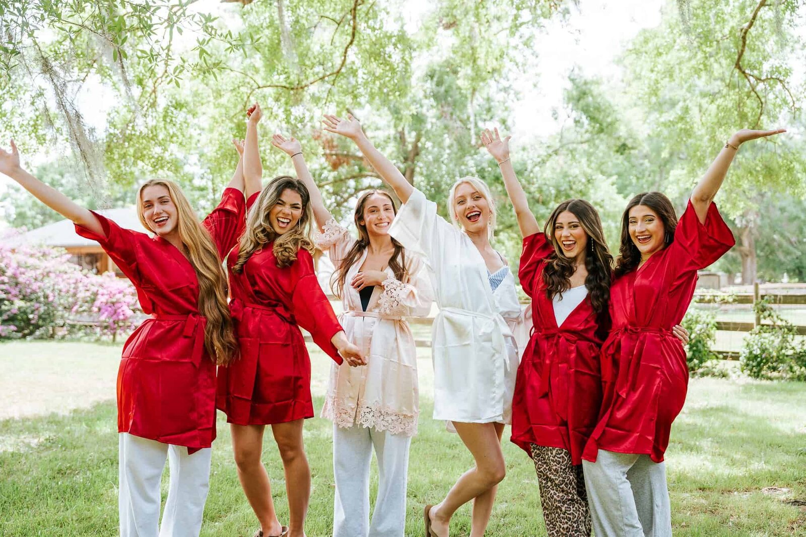 Bride getting ready with her bridesmaids for Magnolia building wedding in Lakeland FL wedding venue 