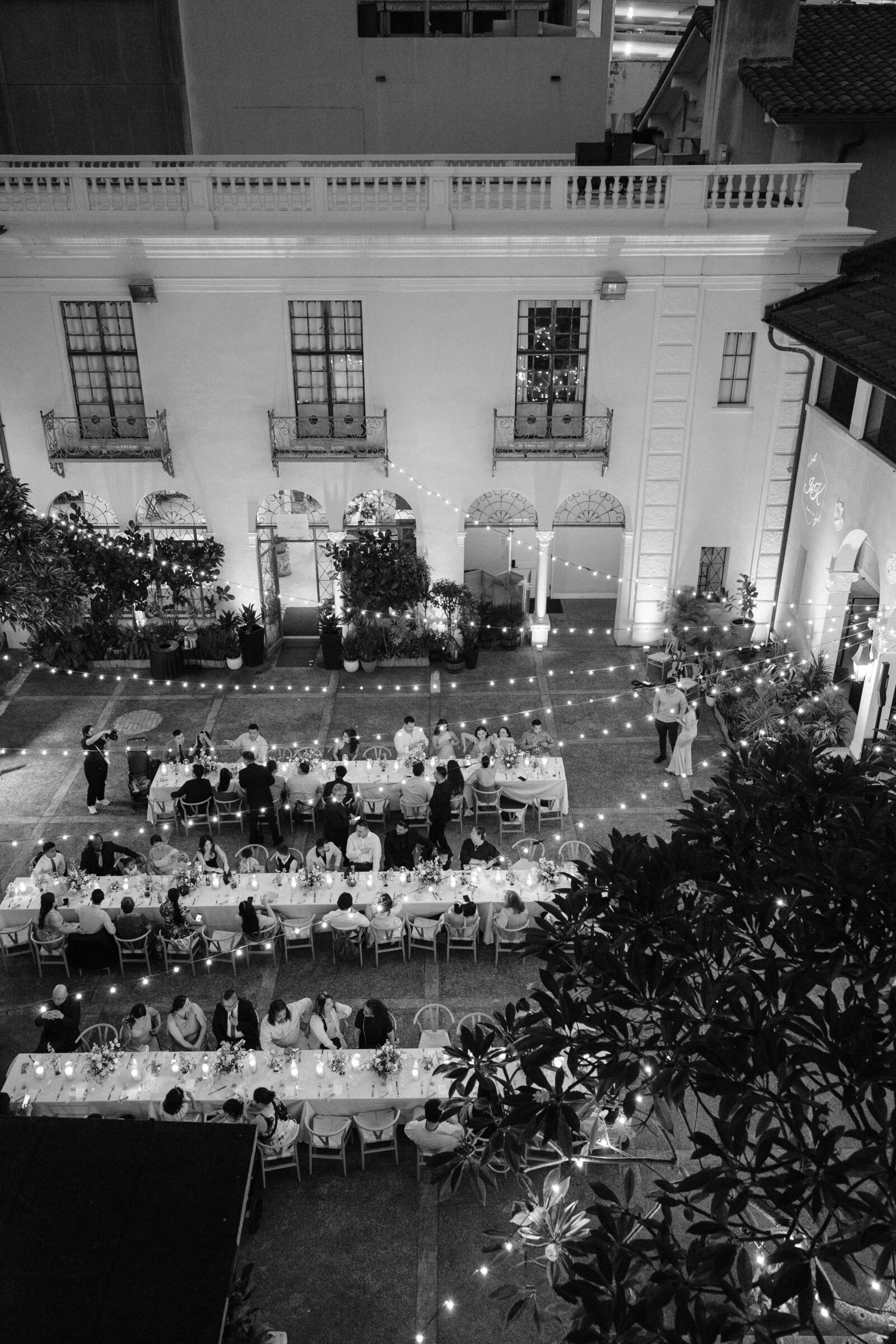Black and white aerial shot of cafe julia reception with long tables