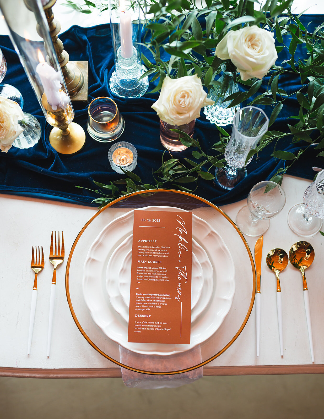 table setting items with copper and teal accents