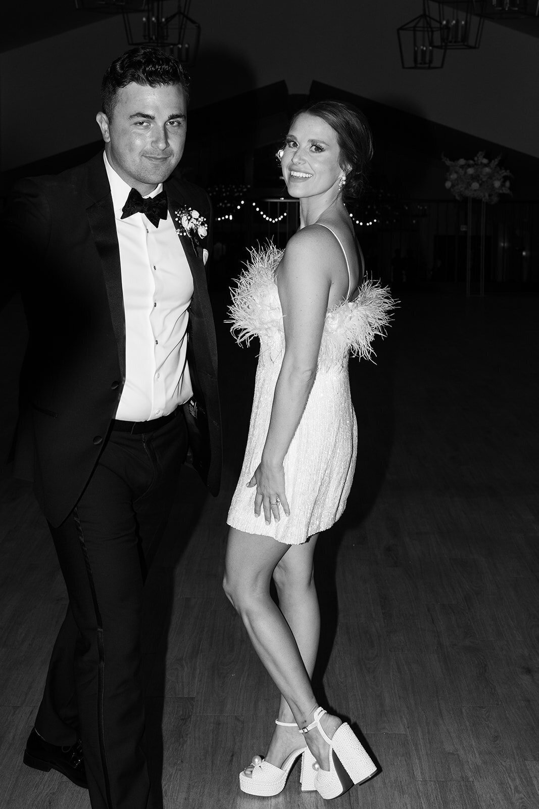high contrast black and white image by bauer creative of minneapolis couple on wedding day