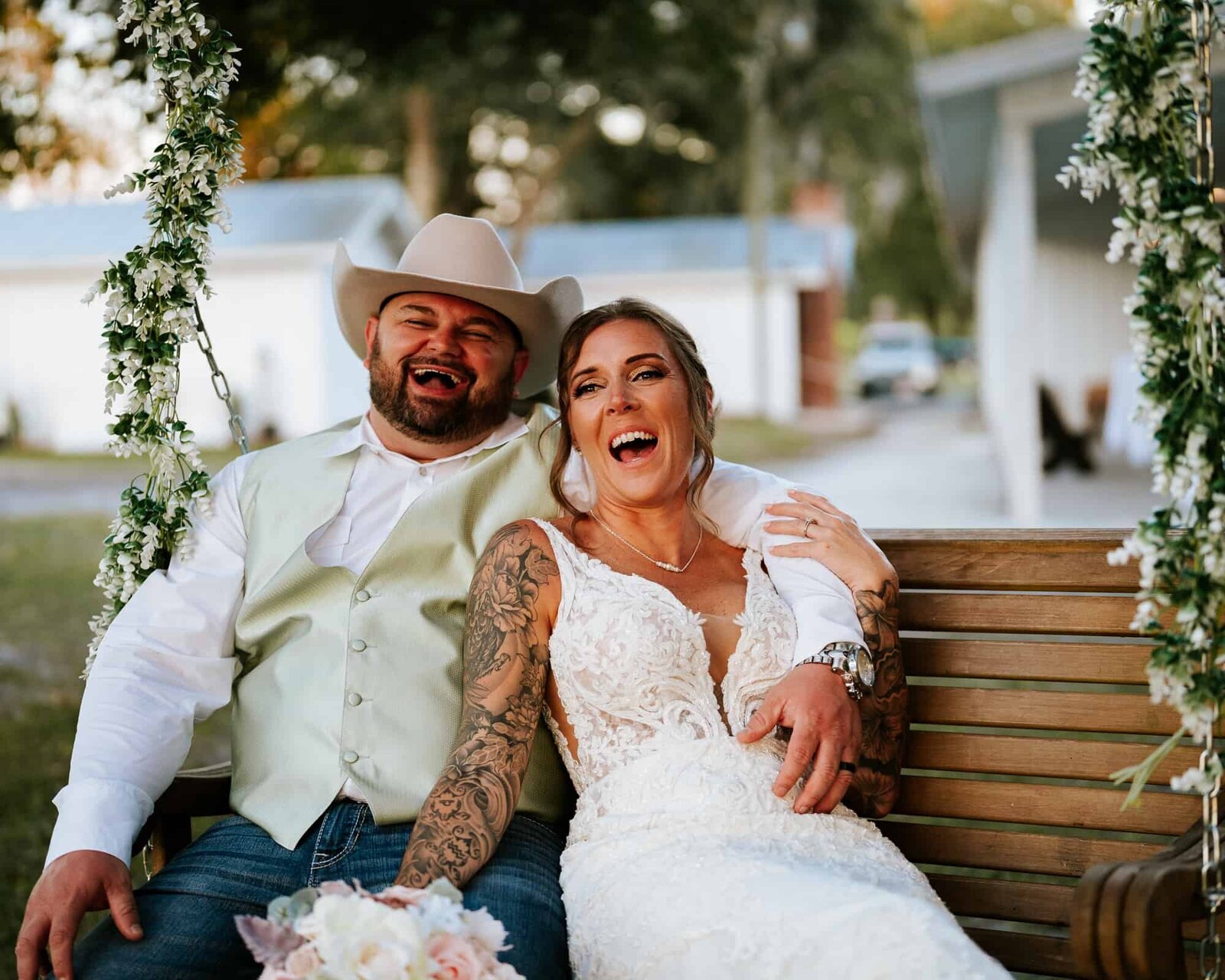 Bride and groom enjoying each others company at sunset