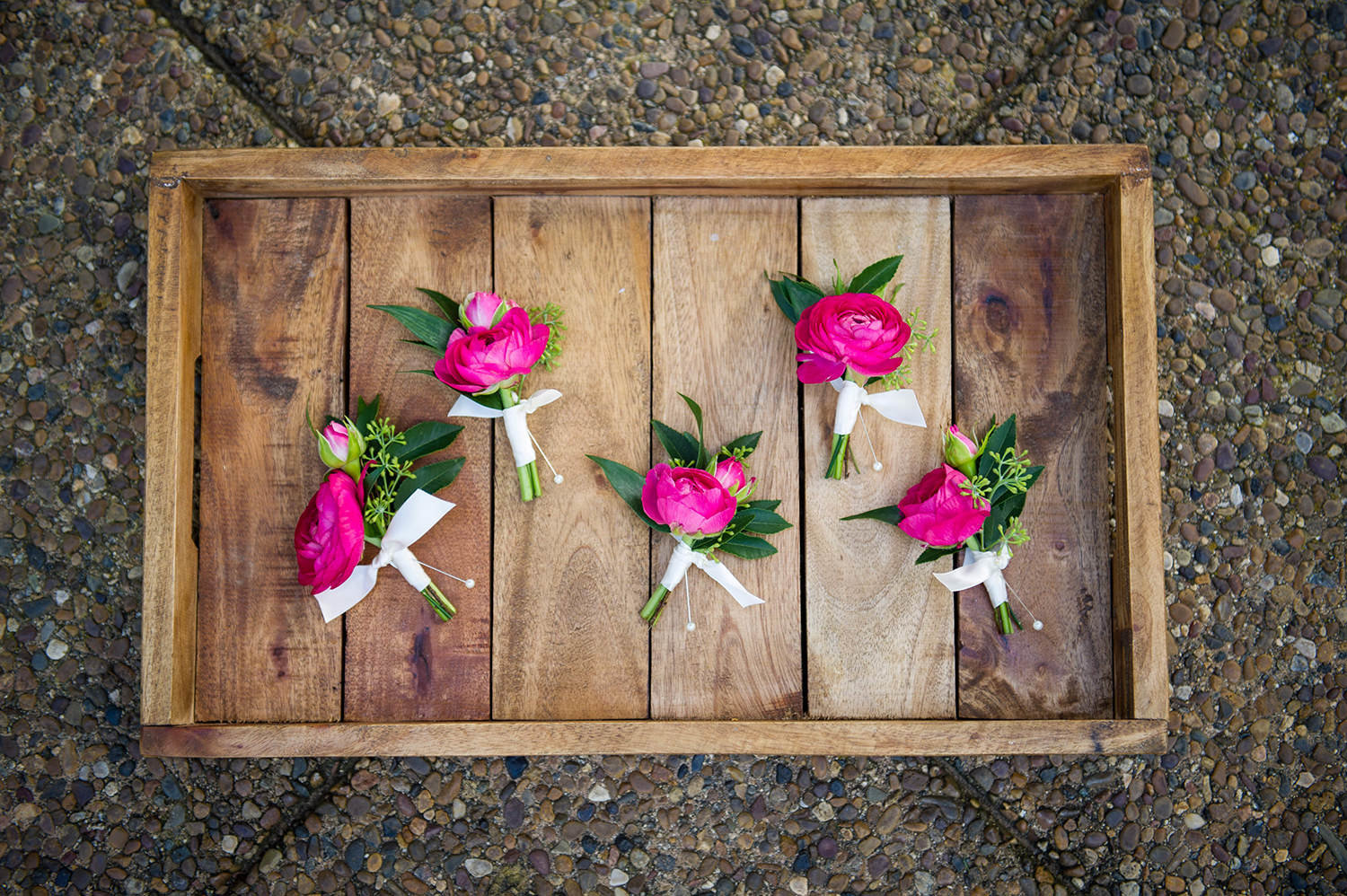 Bright boutonnieres in a box