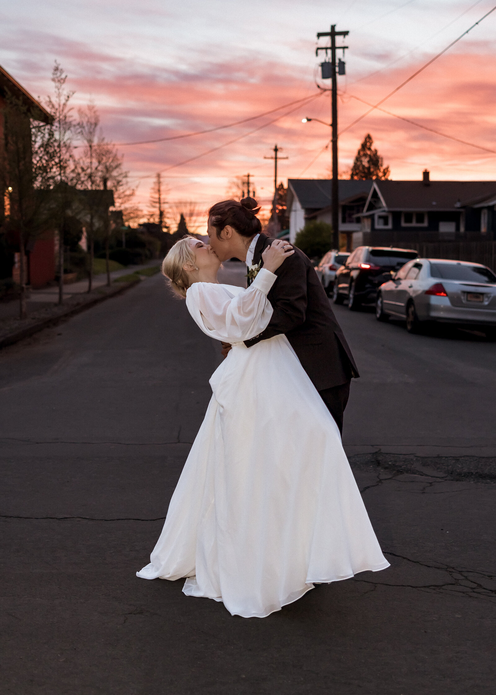 Bride and Groom kissing at Sunset outside of Mildred Hall in Portland Oregon