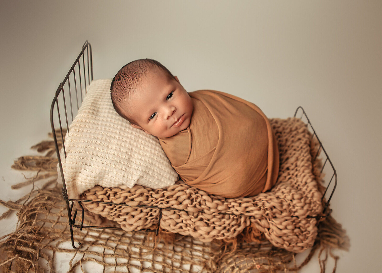 baby boy newborn session in ashley mcclintock photography studio 7