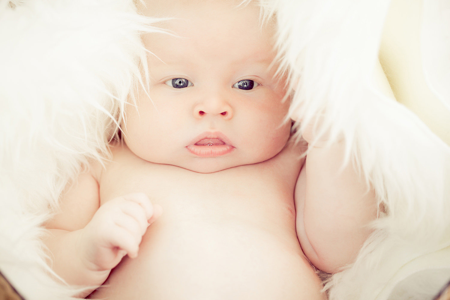 san diego newborn photography | newborn with silly face and big blue eyes