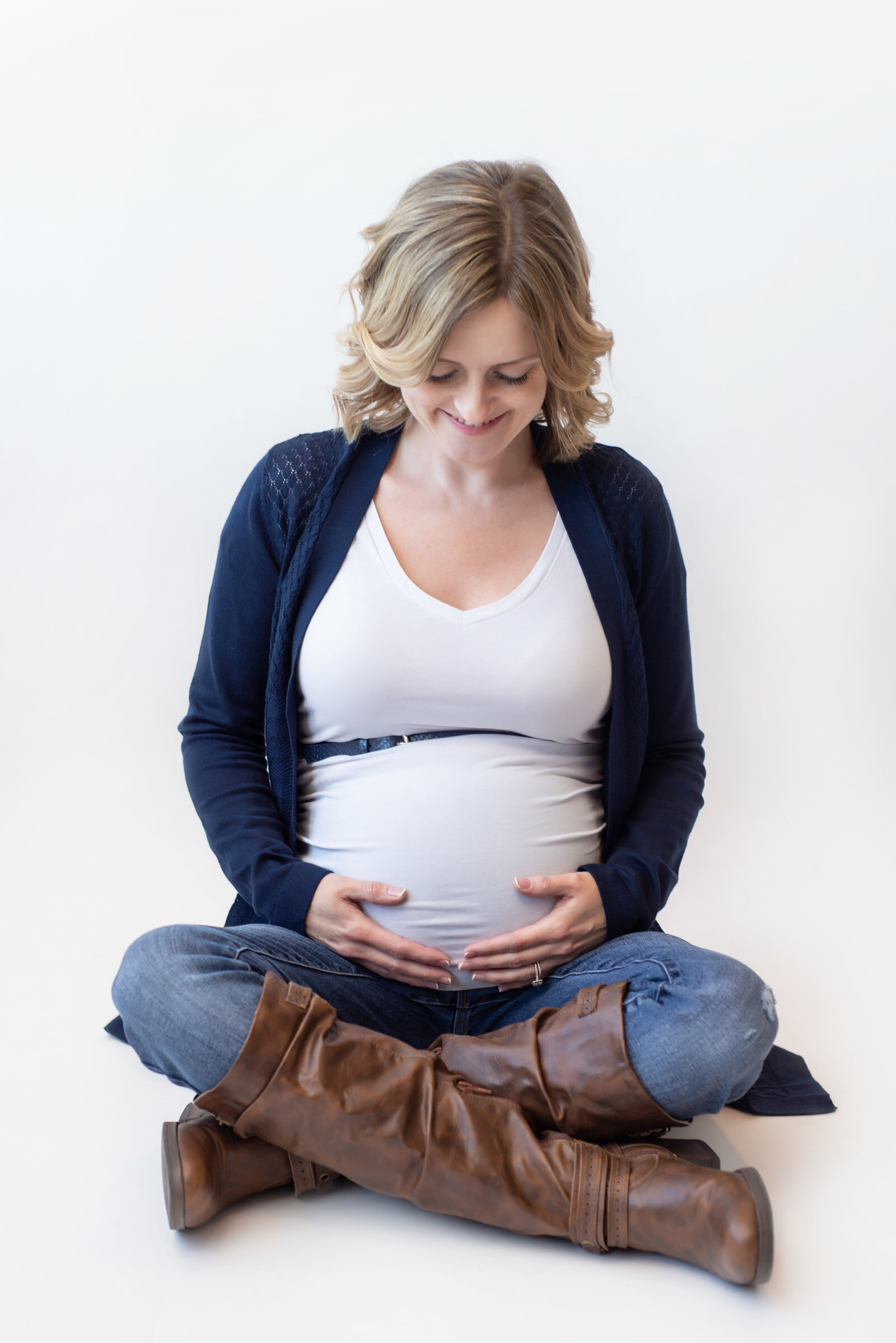 Studio maternity portrait of pregnant woman