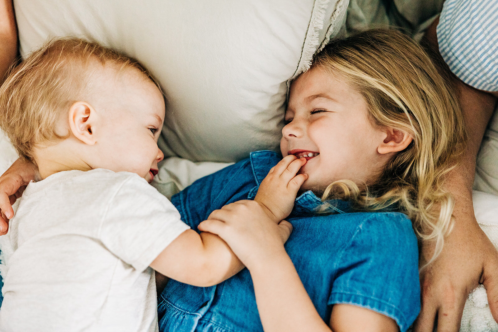 alison captures this tender moment between little brother in the home in st. Pete,  FL