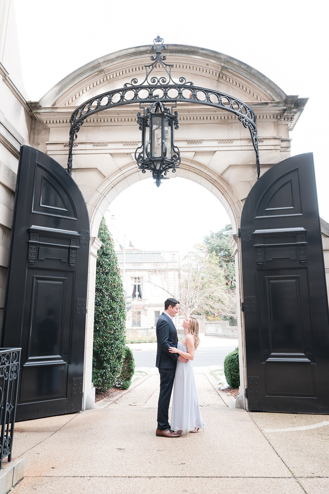 Larz Anderson House engagement photo in Washington DC with couple walking outdoors.5