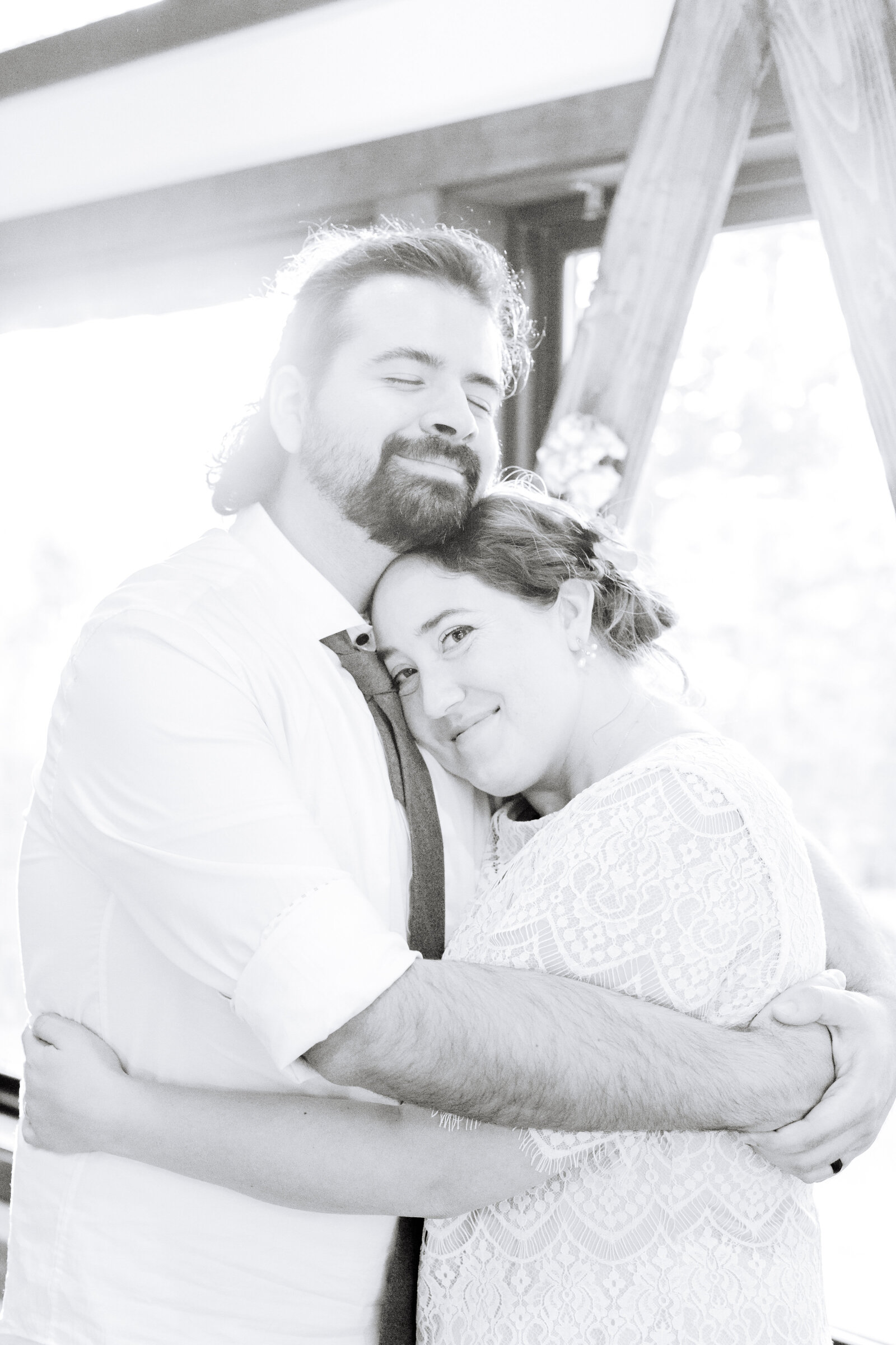A couple celebrates their intimate elopement at a cabin at Big Bear Lake, California.