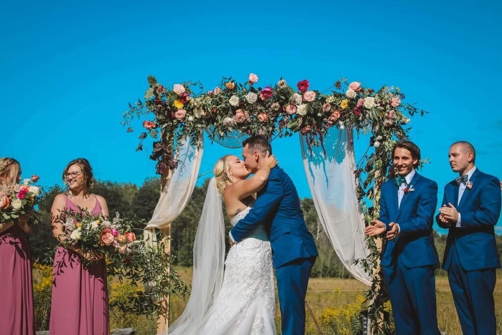 Loving glance between Ottawa newlyweds, bride’s makeup by Red Carpet Glamour reflecting their happiness.