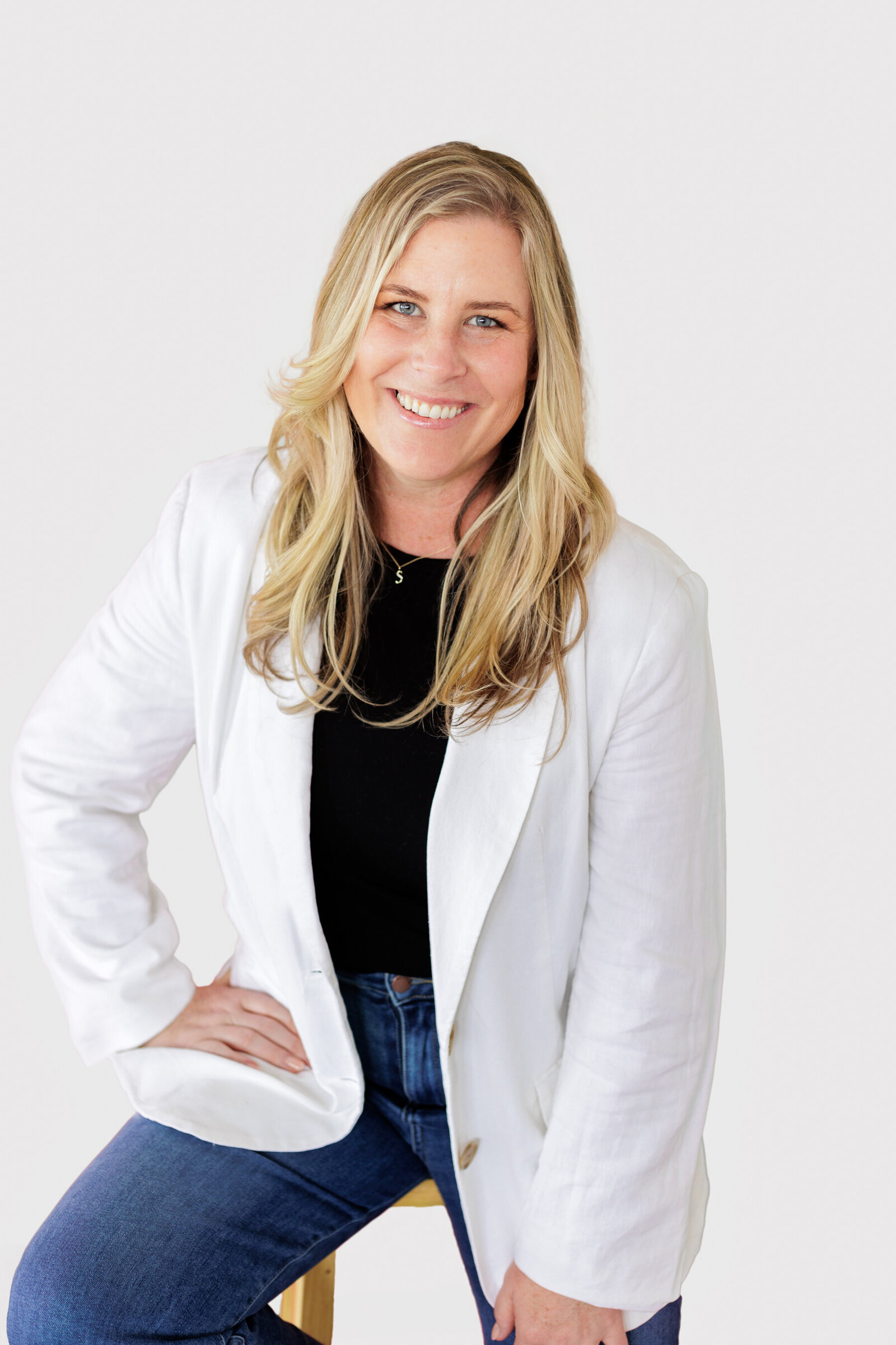 Headshot of woman in business on white background content shoot Portland Oregon