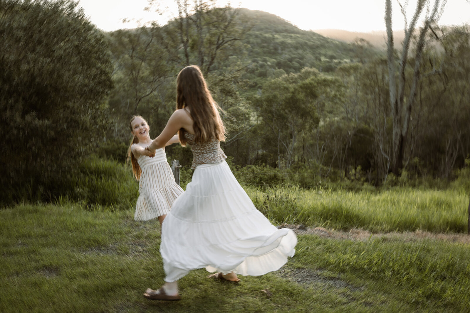 sisters spinning at their in home family photos in mt berryman