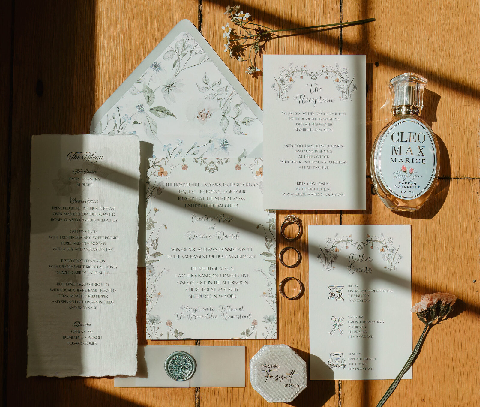 Floral design and wax seal invitation suite