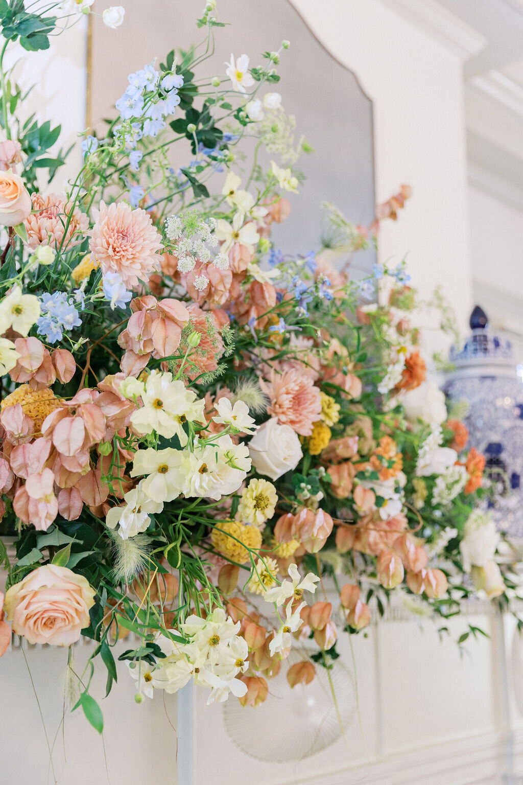 Elegant wedding florals pink white and blue with chinoserie jars