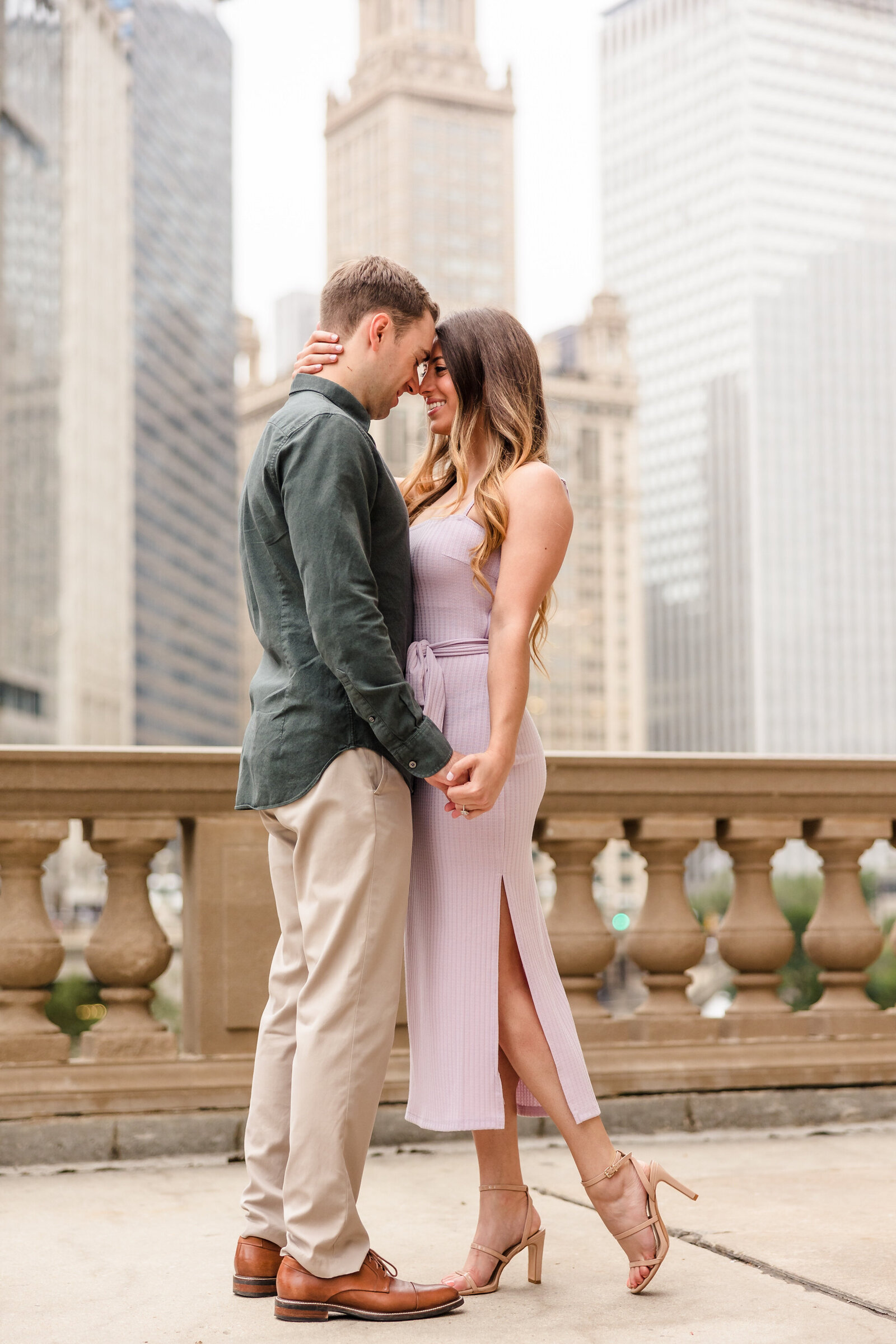 Couple celebrate their engagement  along the Chicago riverfront