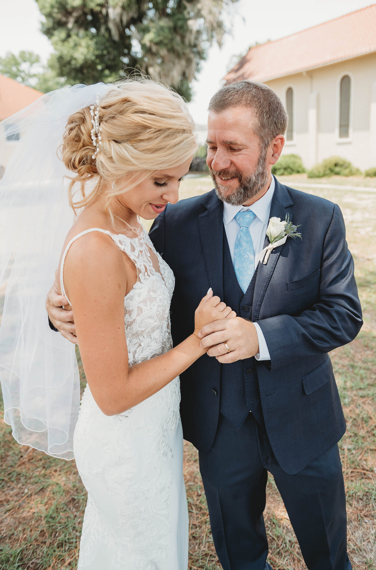 Bride hugs her father before her Micro-Wedding Ceremony in Charleston, SC.