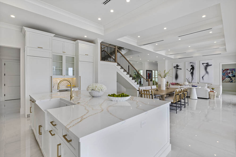 Modern New Kitchen Gold Accents Coastal Colors and Bold Artwork
