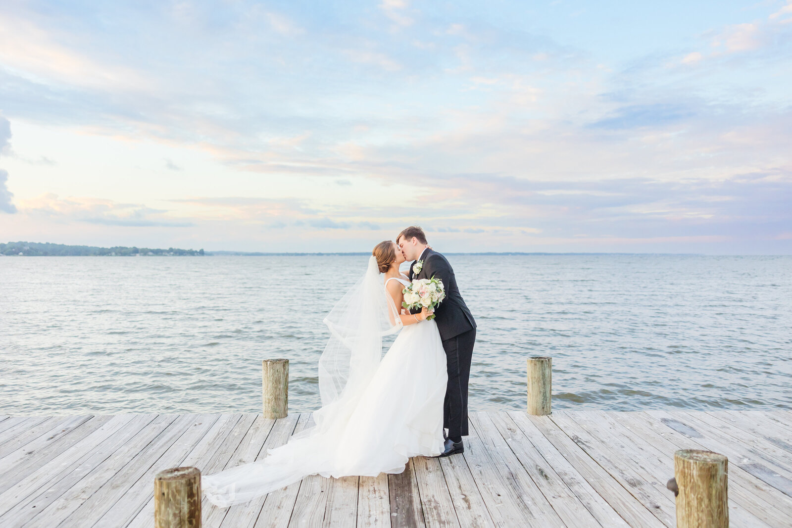 Baltimore wedding photography of couple on a dock