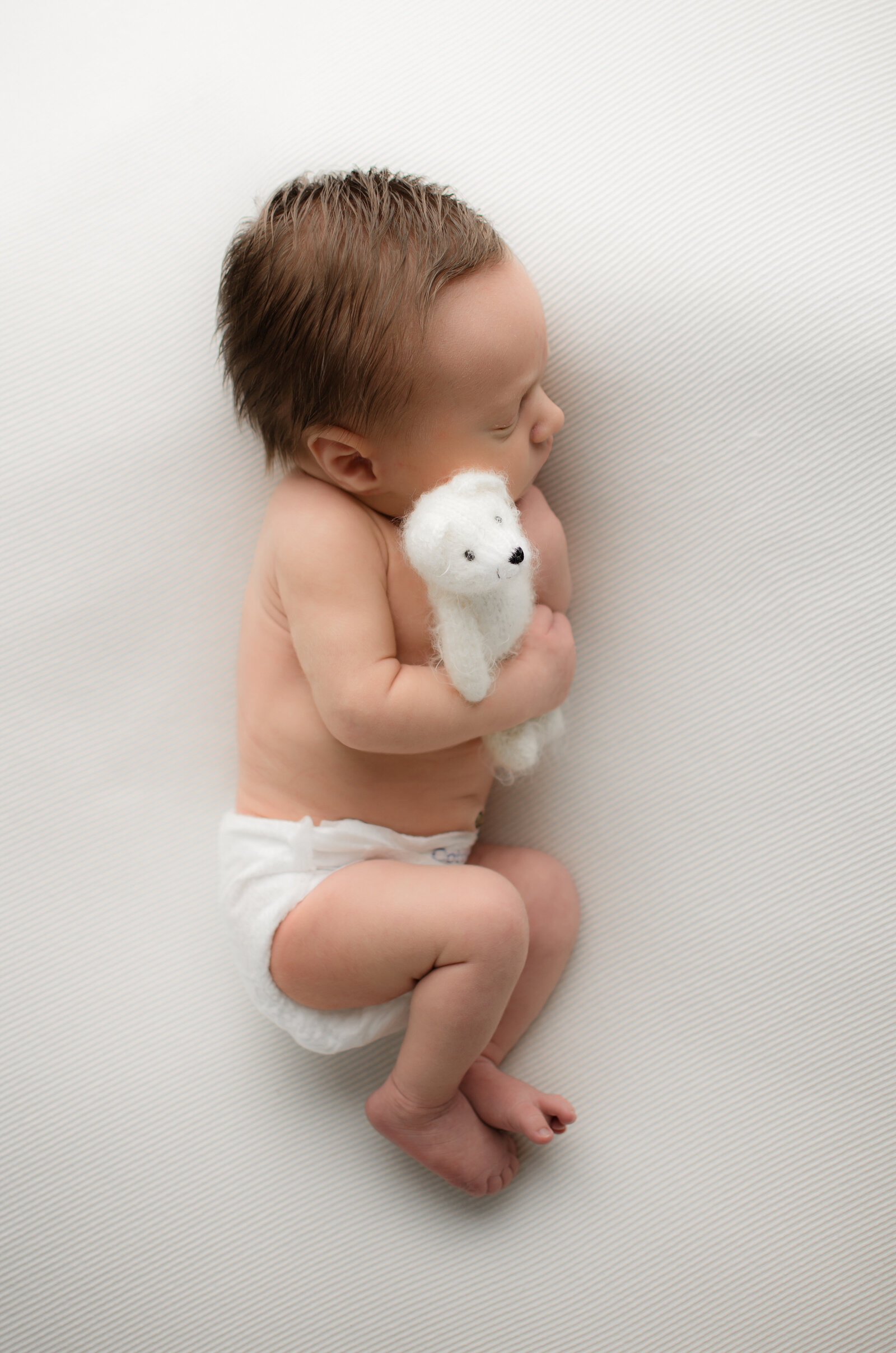 baby boy simple white backdrop