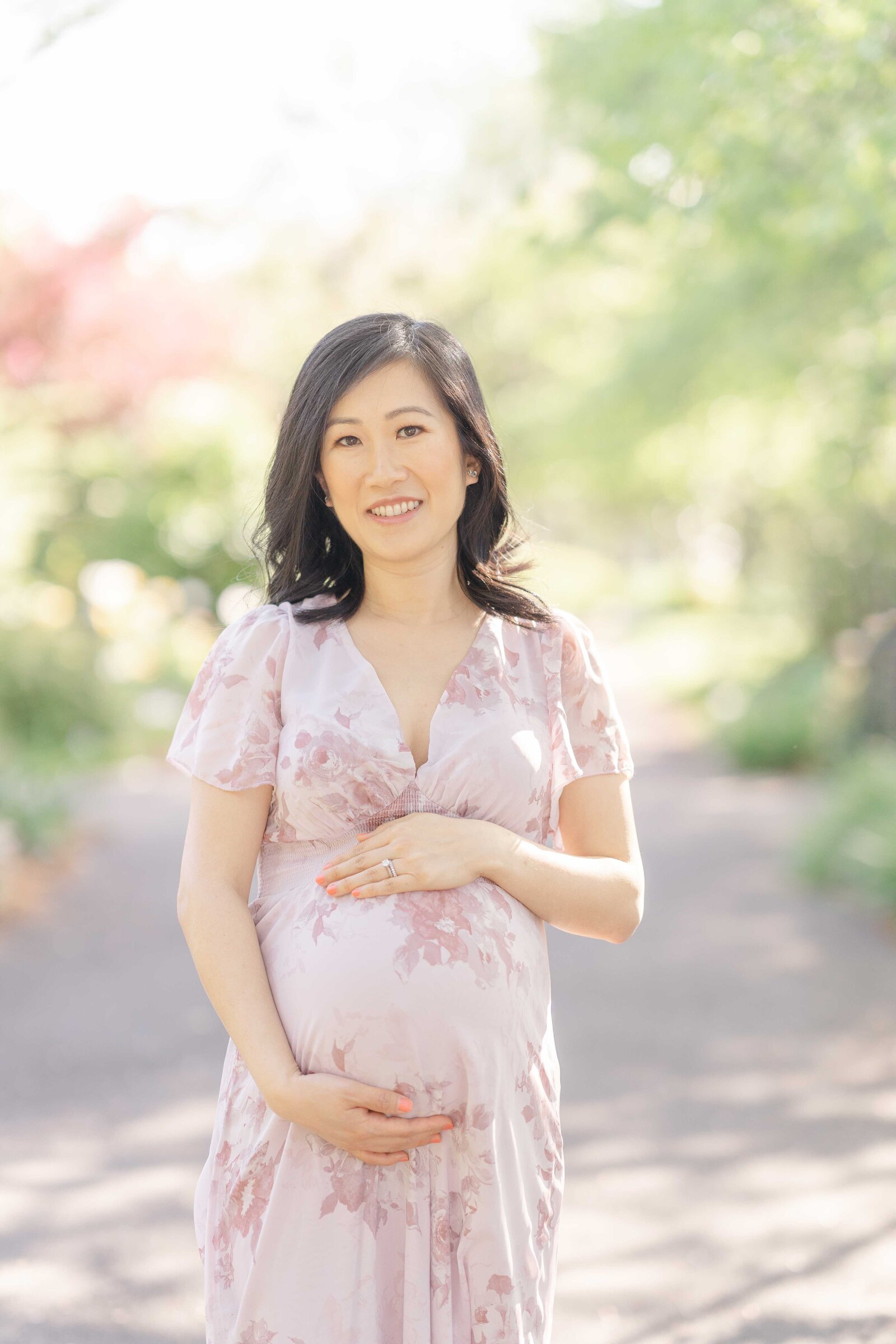 mom smiling during Asburn, Virginia maternity session