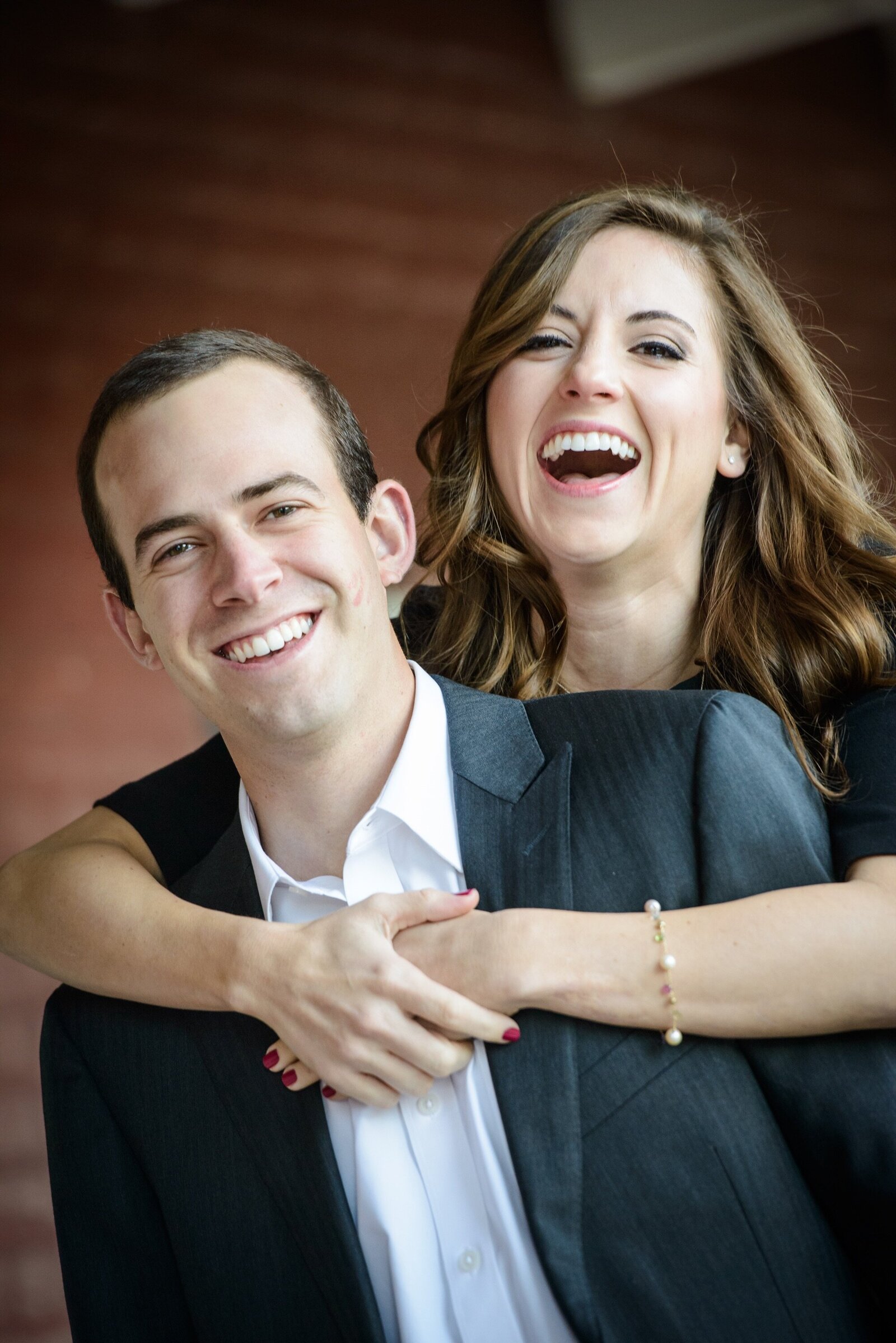 Baton Rouge engagement portrait of couple laughing