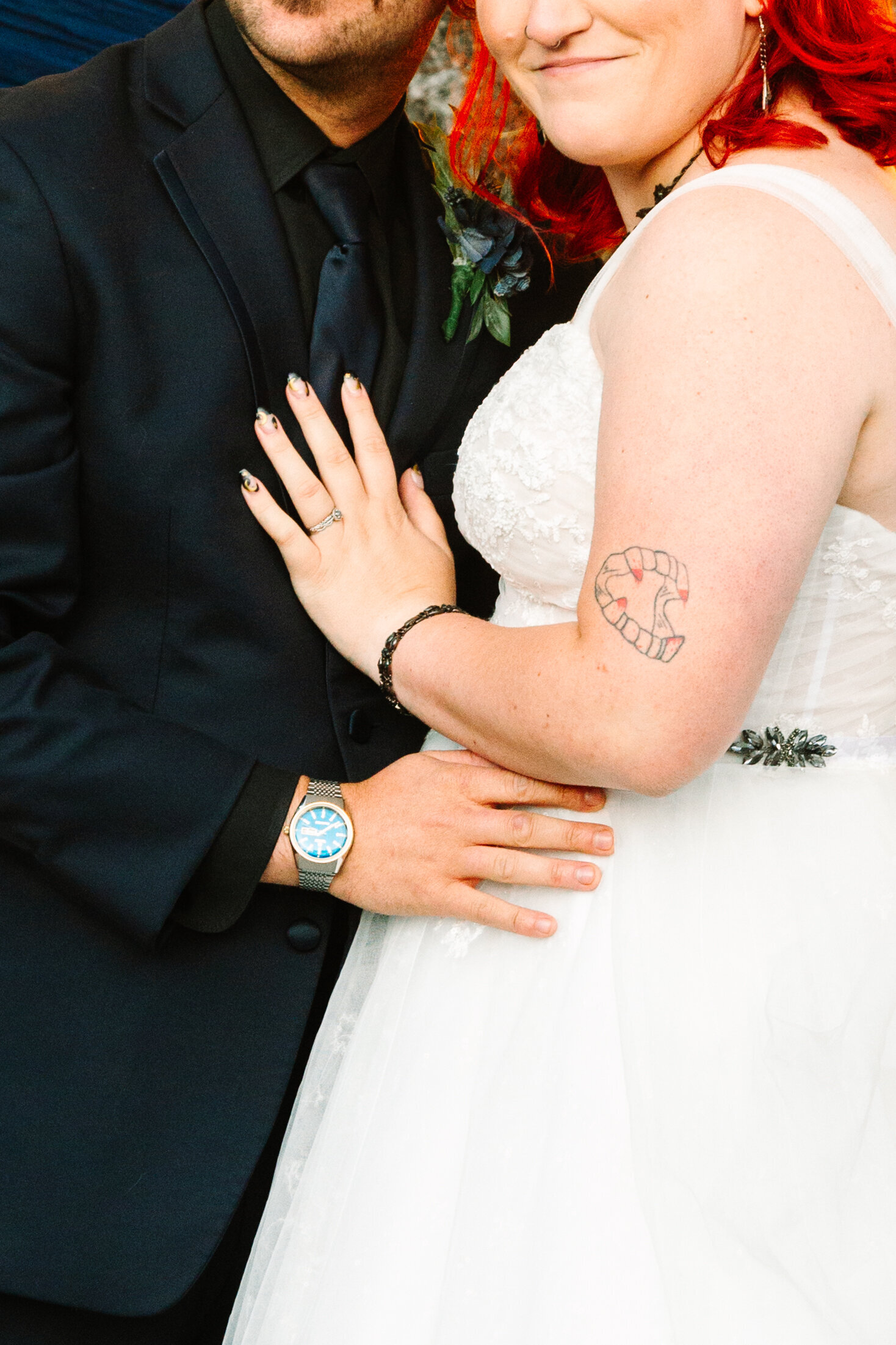 Tattooed bride and groom.