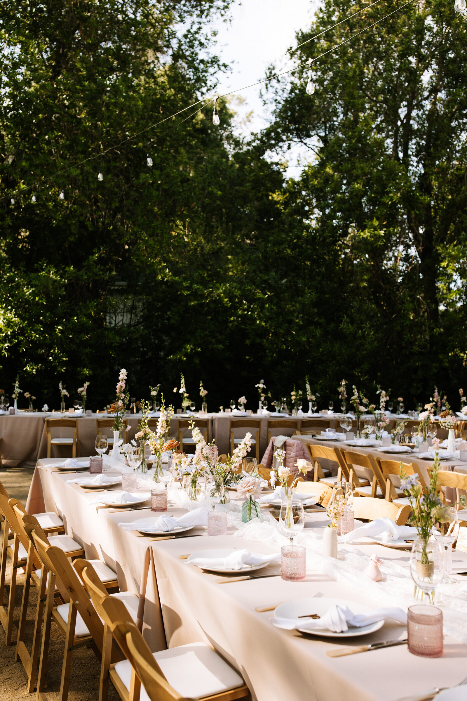 Elegant tablescape with florals and candles for golden hour McCall wedding reception 