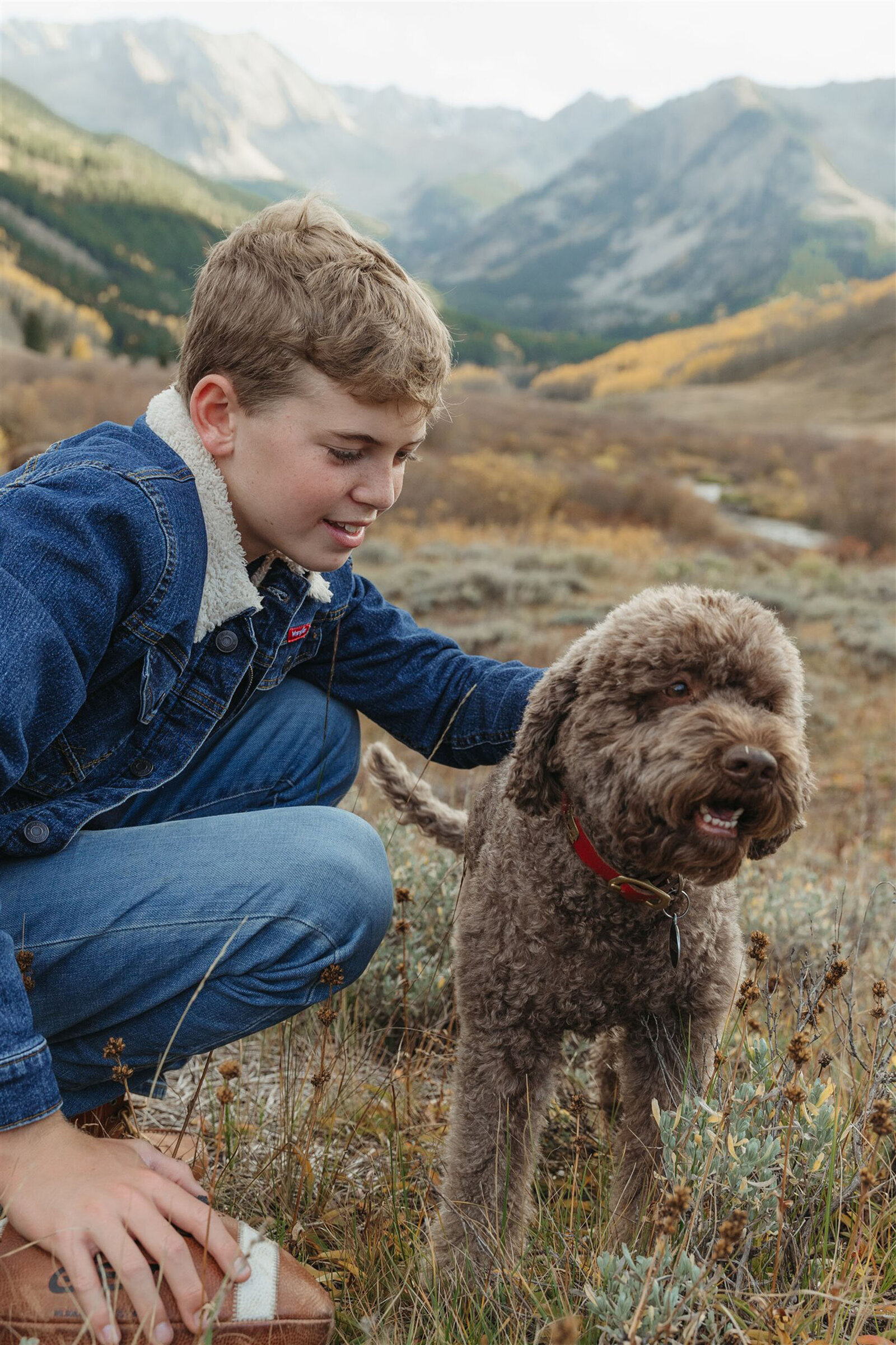 Editorial-style Aspen couples portrait — classic layers and refined textures styled against the Rocky Mountain backdrop.