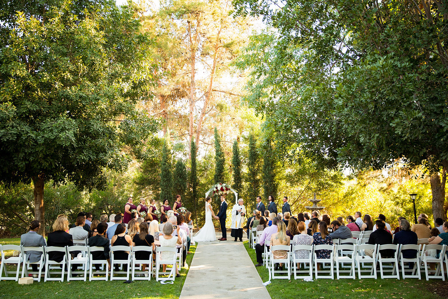 bride and groom at ceremony space carlton oaks country club