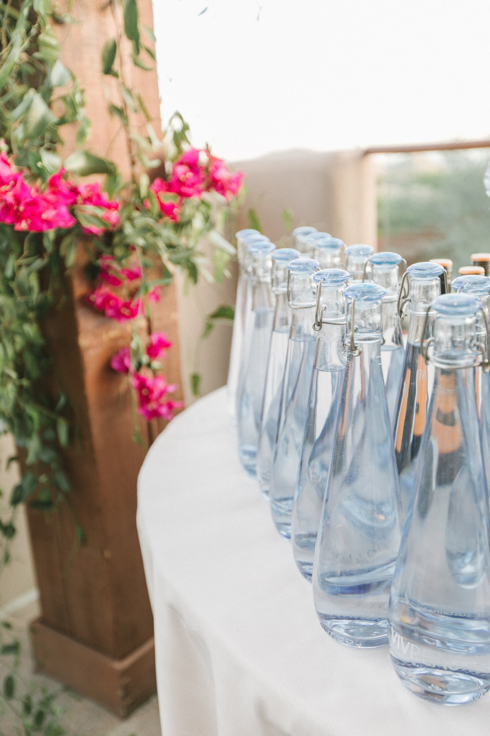 Blue bottle decor at wedding reception