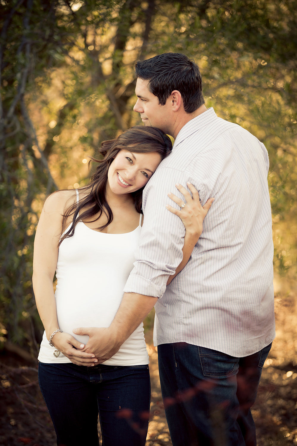 Love this sweet moment during San Diego Maternity Session.