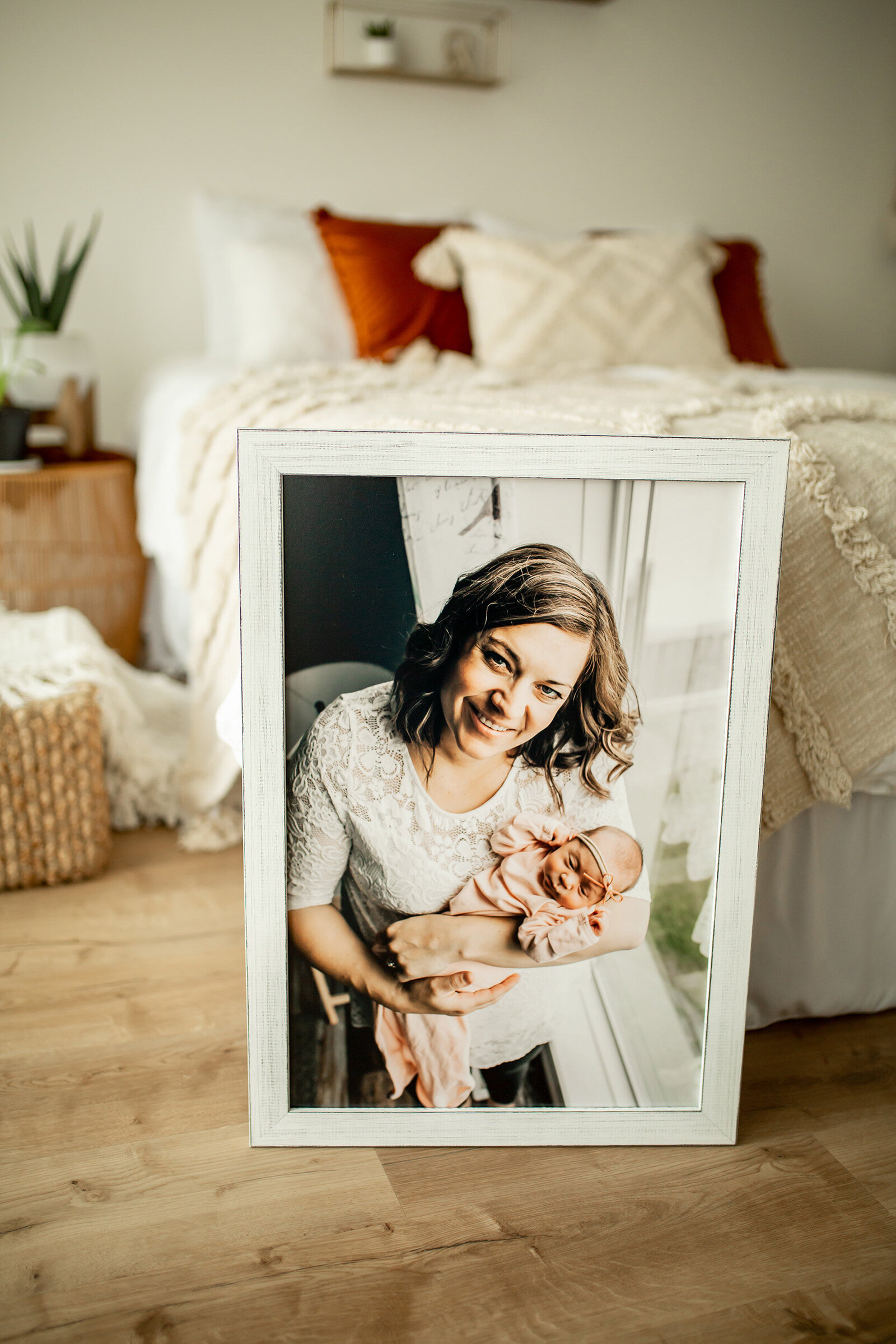 mother and daughter photo in a large white frame