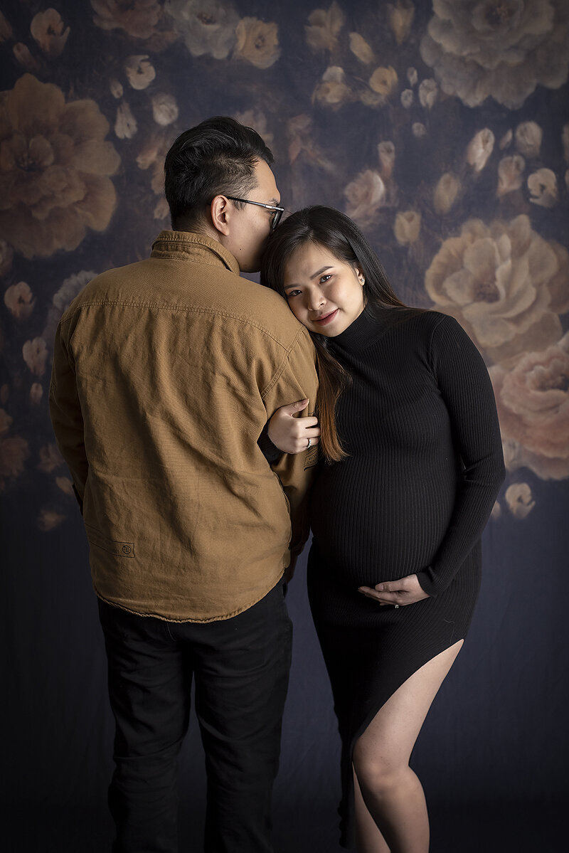 Modern mother and father at maternity session.