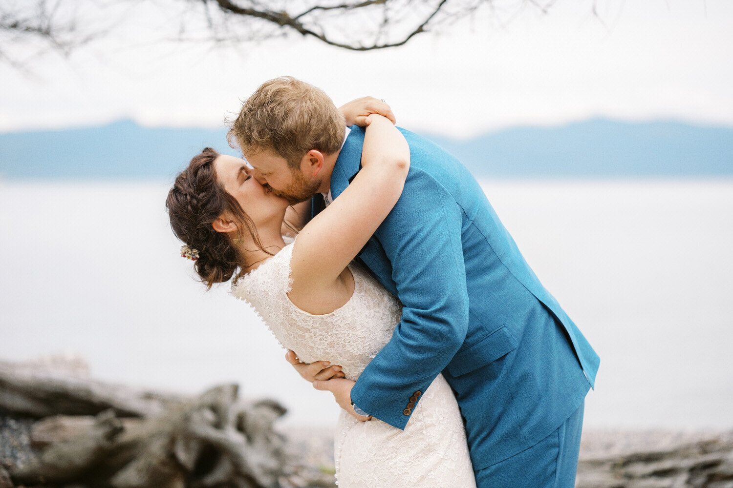 Bride and groom first kiss at Guemes Island Resort.