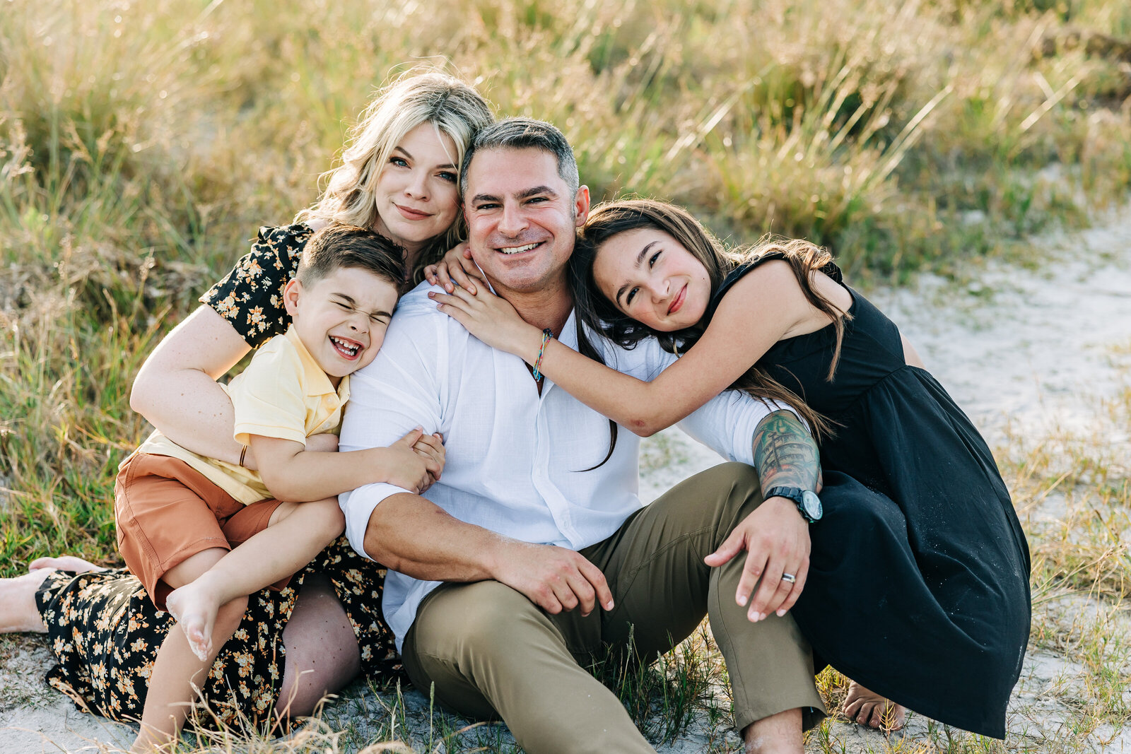 Family Photo taken by alison amick photography on Fort Desoto beach near St. Pete