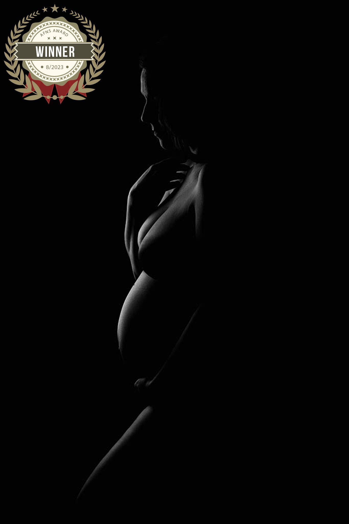 Mom to be poses in black and white silhouette portrait  studio located in Murrysville Pa.
