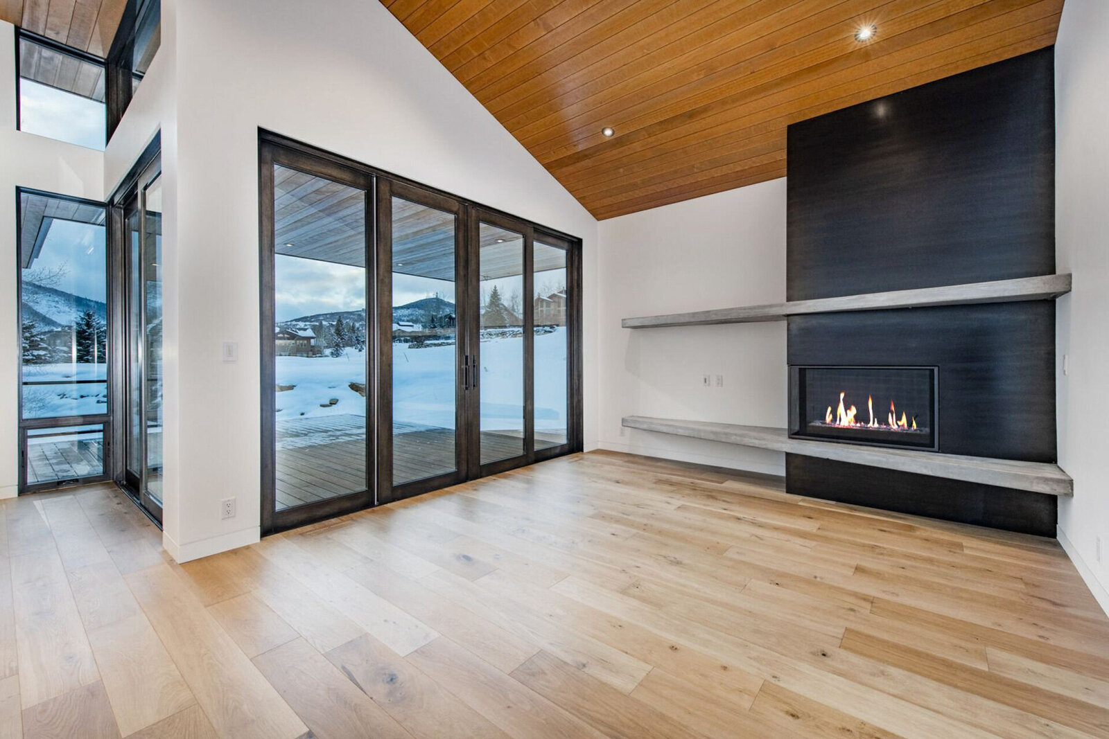 Deer-Valley-Interior-Designer-Chalet-and-Co-living-room-fireplace-modern-style