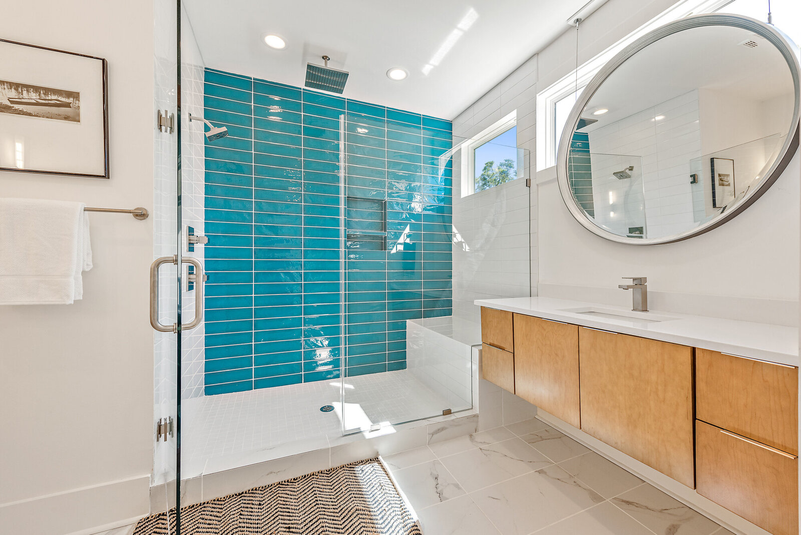 Custom bathroom interior design with colorful tile. Design by Gracious Home Interiors in Waxhaw, North Carolina.