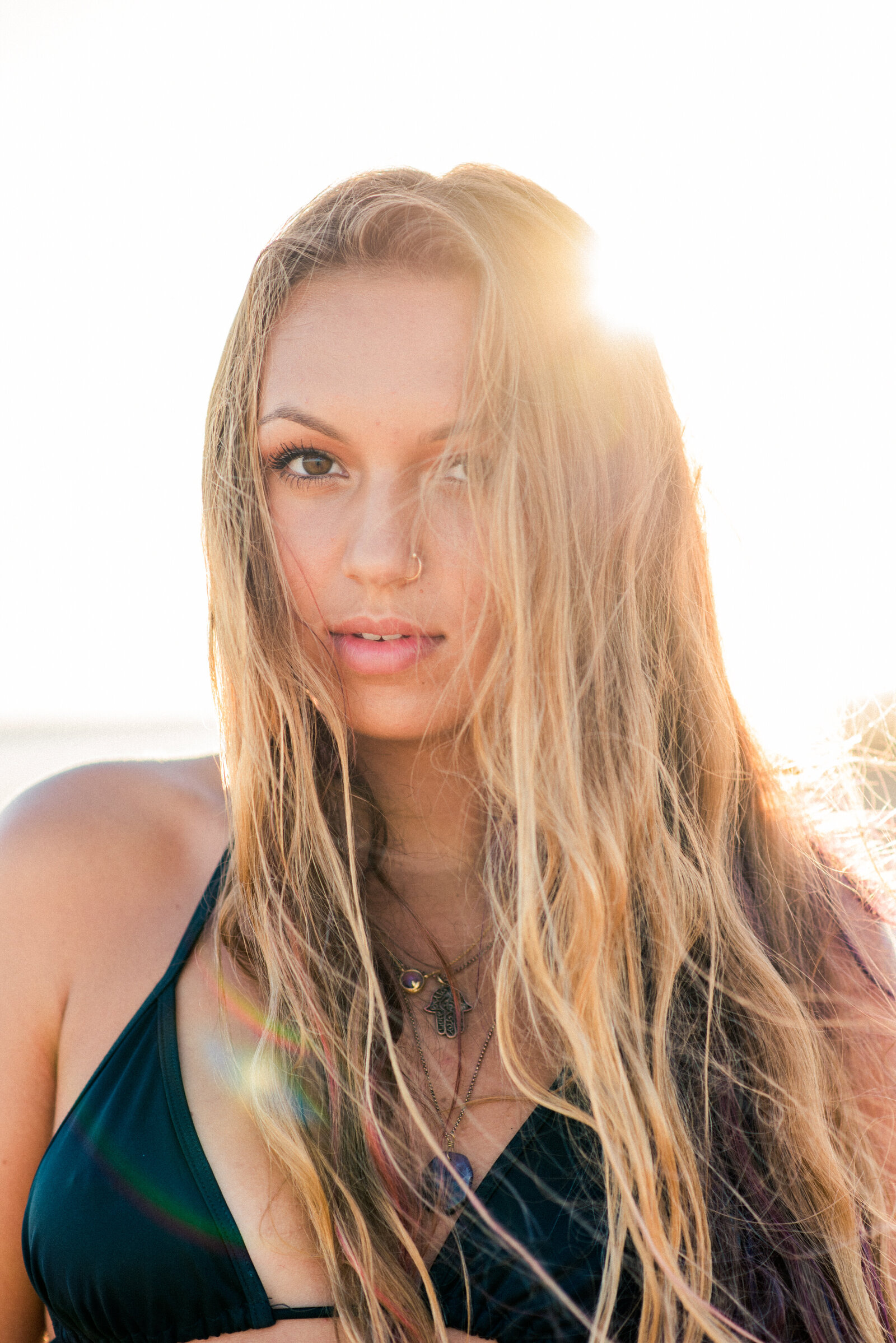 girl on beach in sunlight