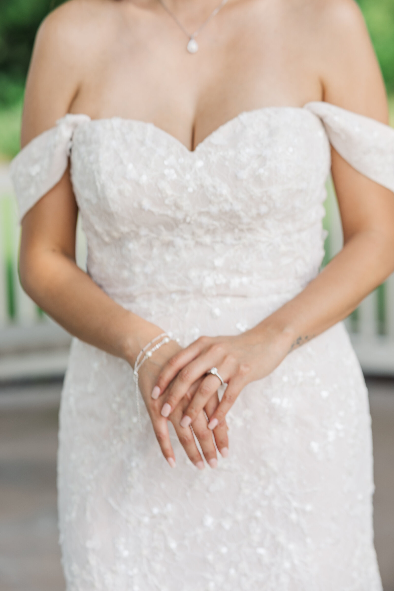 Detail close up photography of bride's wedding dress