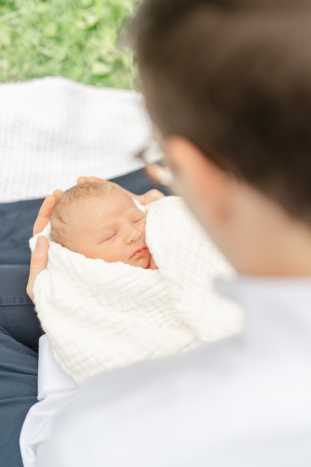 baby boy held by dad during Loudoun County, Virginia newborn photo