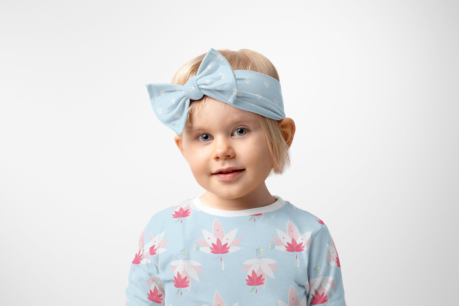 Blue, white, and pink patterned children's headband and shirt