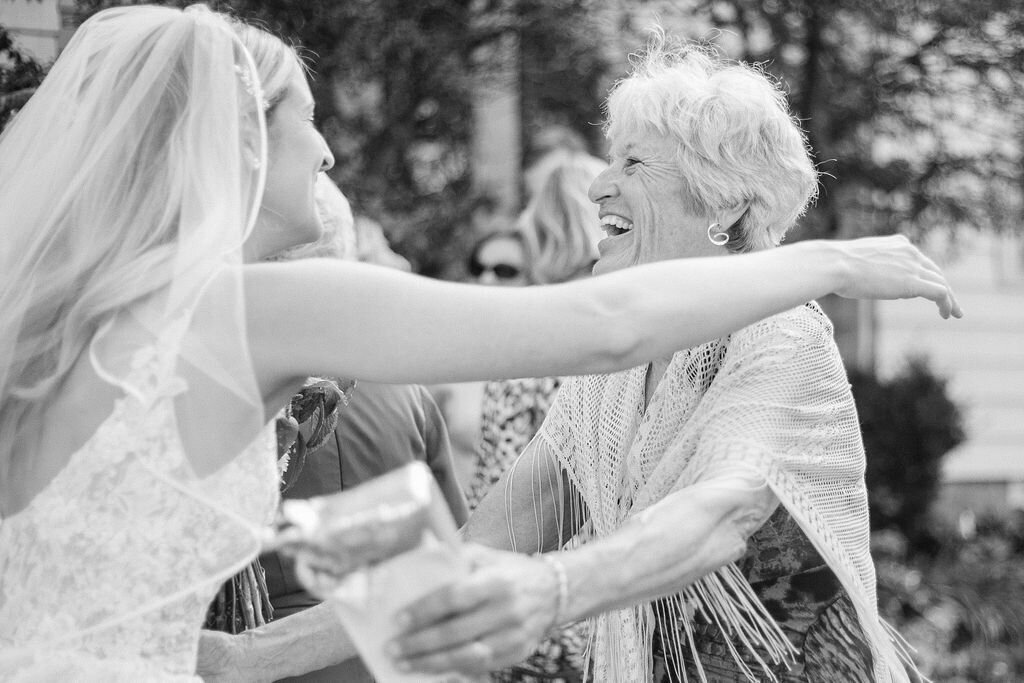 Candid black and white wedding photography by Emi Rose Studio