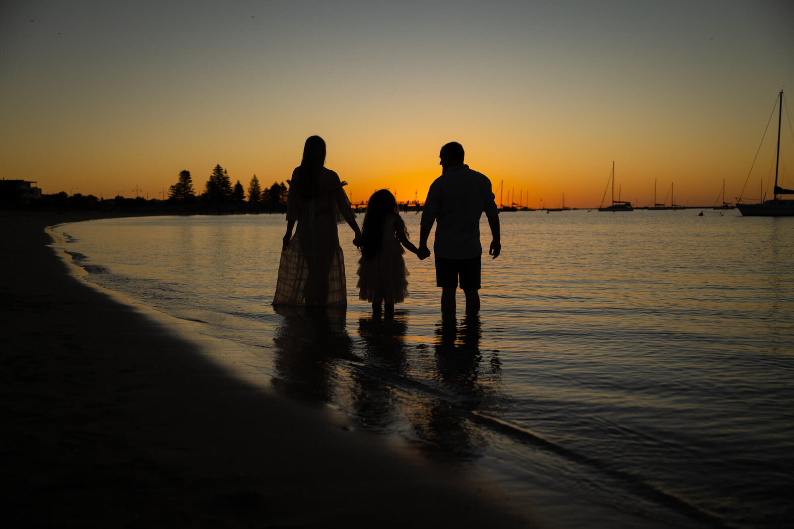 sunset-silhouette-family-of-3