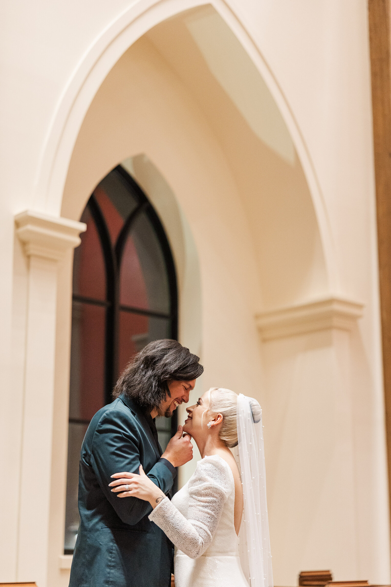 Bride-groom-looking-at-eachother-smiling