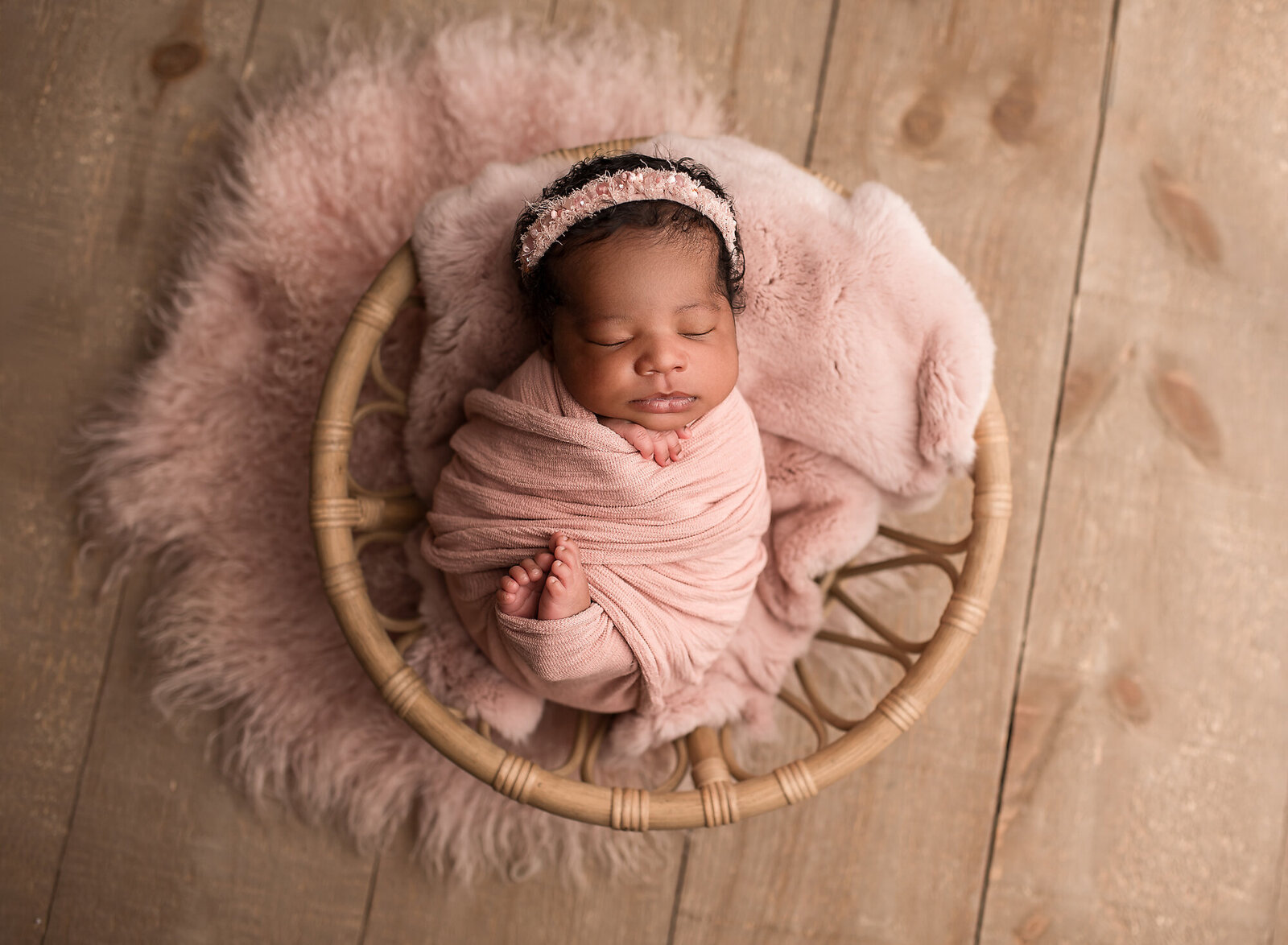 newborn in pink at Menifee photography studio
