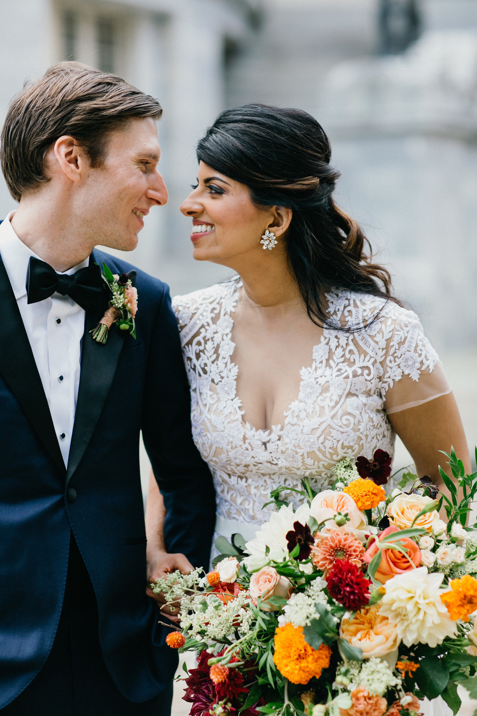 Beautiful bride and groom photographed together after the wedding ceremony in Old City.