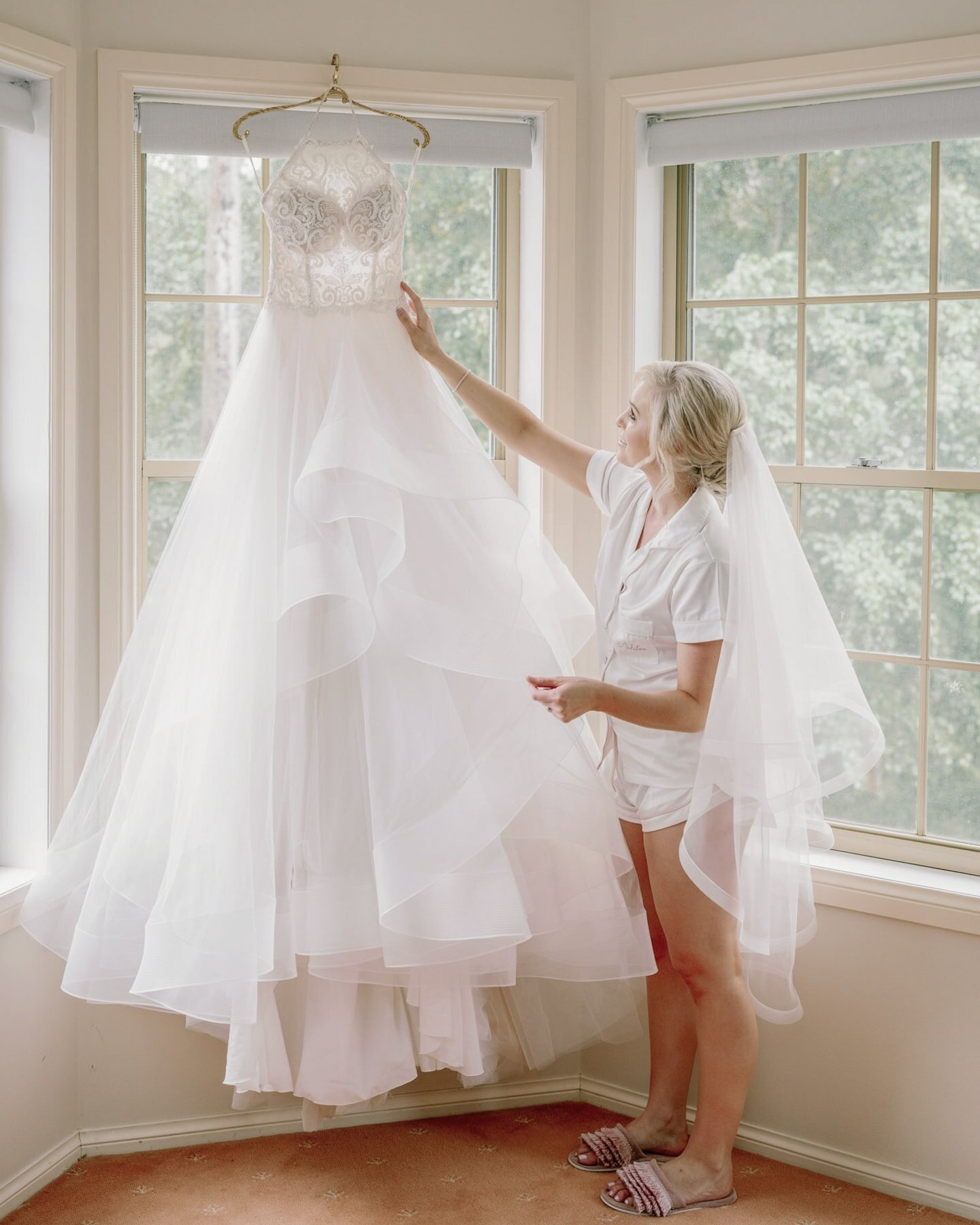 Bride with her Oksana Mukha wedding gown