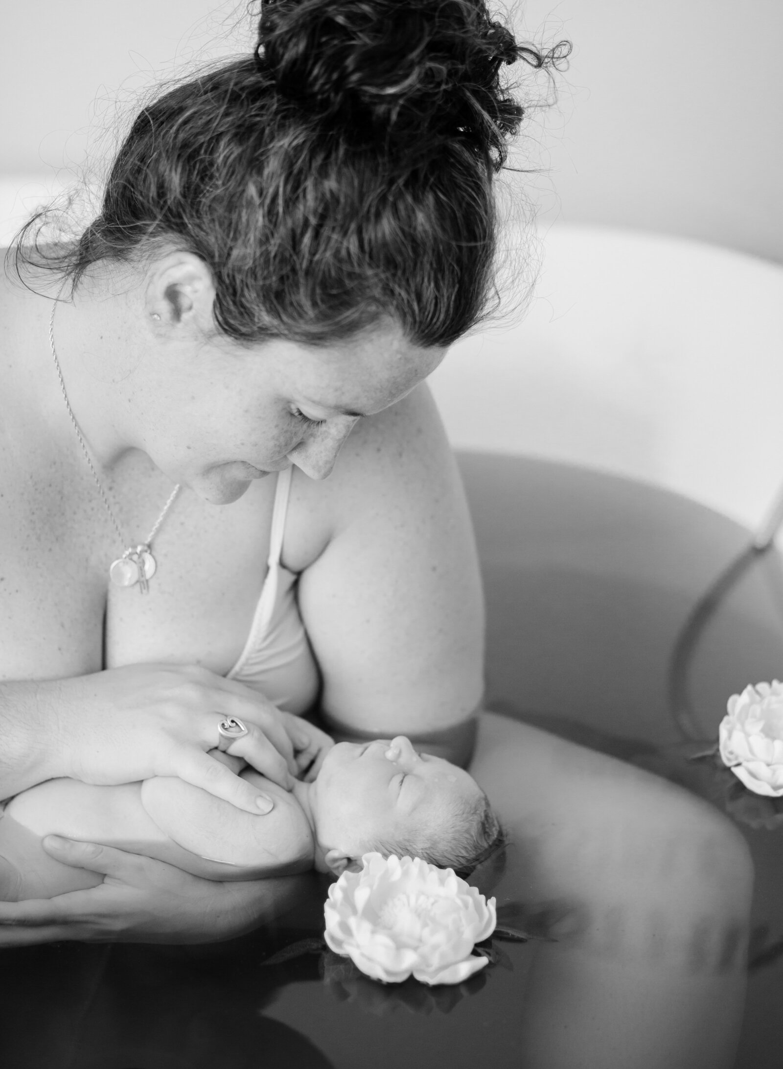 mom and baby in herbal bath