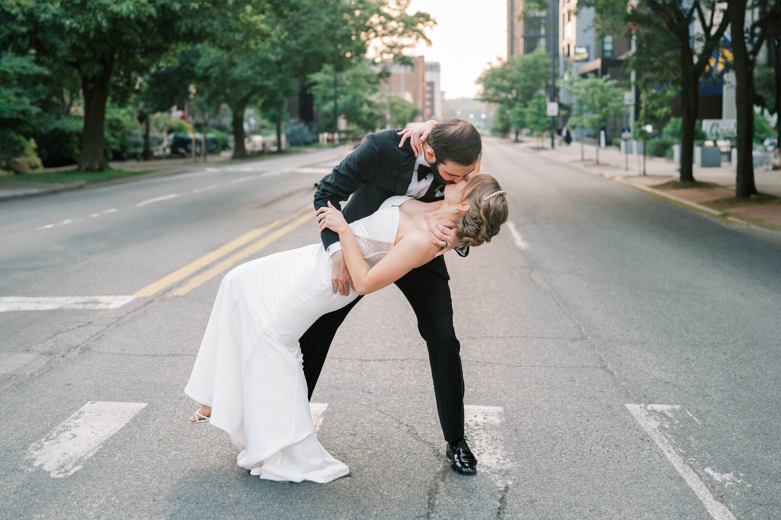 bride and groom dancing outside in Ann Arbor MI